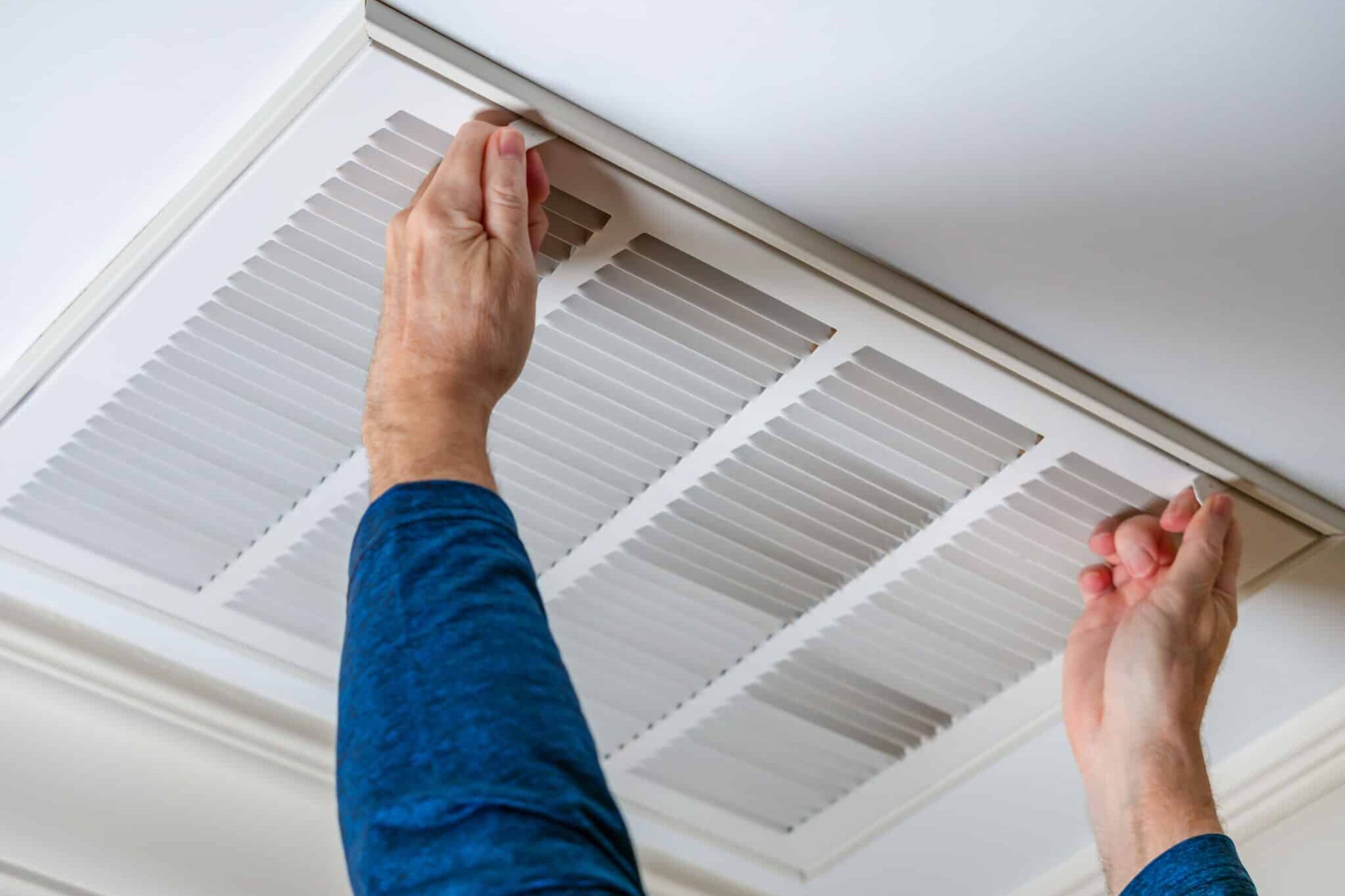 Man,Opening,Ceiling,Air,Vent,To,Replace,Dirty,Hvac,Air man opening ceiling air vent