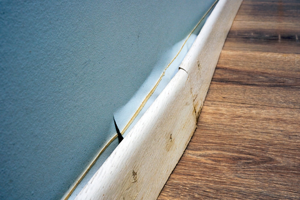 baseboard with water damage
