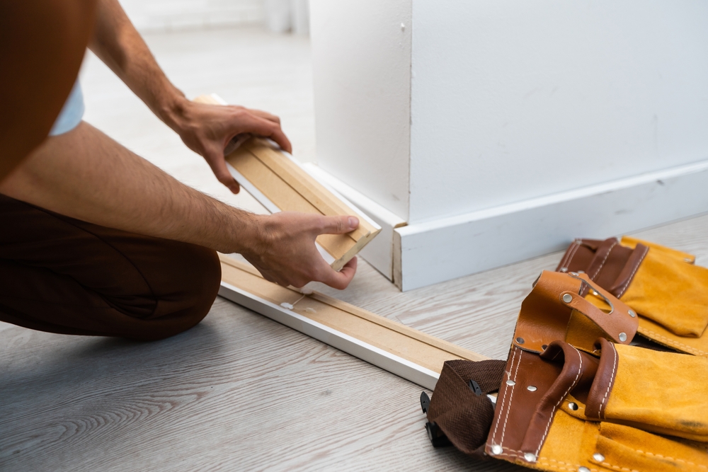 water damaged baseboard repair