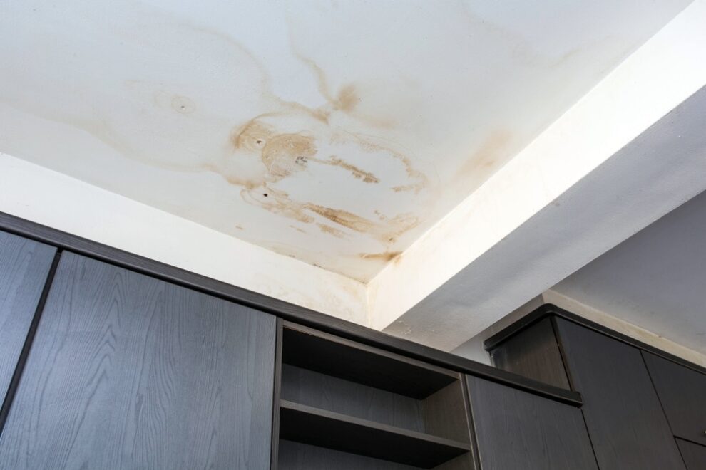 Brown water stain on ceiling